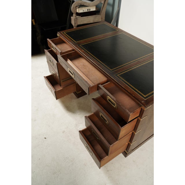 Vintage Sligh Campaign-Style Pedestal Desk with Inlay Leather Top. Bring timeless character and classic craftsmanship to...