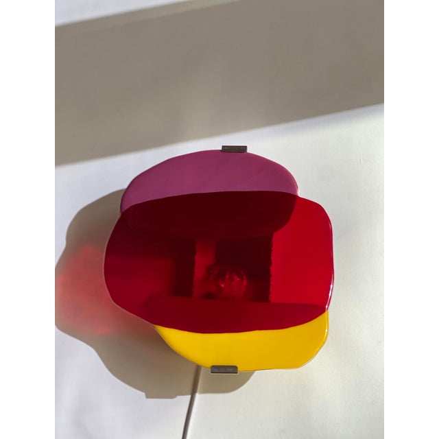 Handcrafted glass wall light handcrafted wall light born from the desire to blend light with the vibrant colors of...