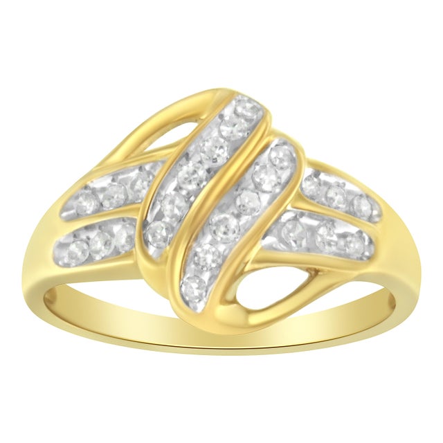 This gorgeous floral style statement ring is crafted in 10 karat yellow gold flashed 92.5% sterling silver. Natural,...