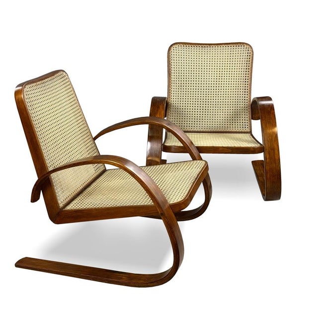 A remarkable pair of post-war czech armchairs designed by m. Navrátil and z. Plesník between 1949 and 1952 for the private...