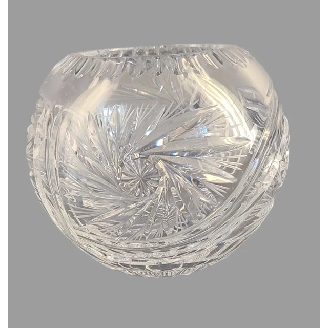 This stunning vintage crystal vase is perfect for adding a touch of romance to any room. With a beautiful cut glass...