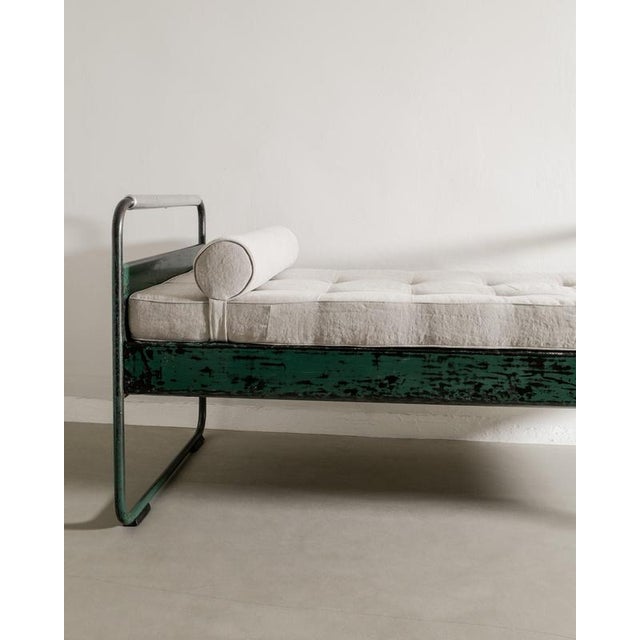 A rare green lacquered french mid century "no 17 / fabert" daybed in aluminium, metal designed by jean prouvé and produced...