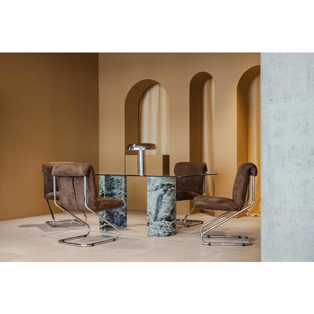 Tubular chrome-plated Z-shaped silhouette exemplifies the functional elegance of midcentury modern design. Its sculptural...