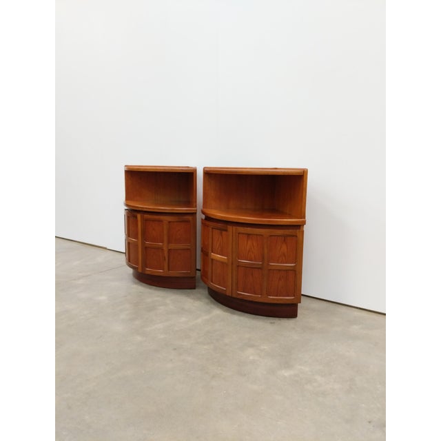 Pair of authentic vintage mid century modern teak low corner cabinets / nightstands. By Nathan Furniture. Maker's label...