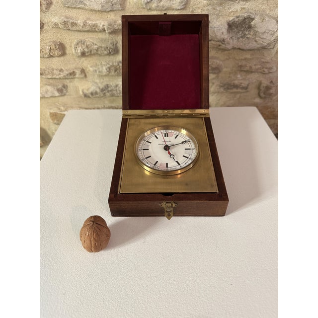Rare clock in a case by jaeger, clockmaker to the french navy, with an original (rare) electronic movement licensed by...