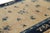 Made with hand-knotted wool in China circa 1910-1920, this 9x11 antique Chinese rug is a rare Peking rug of exceptional...