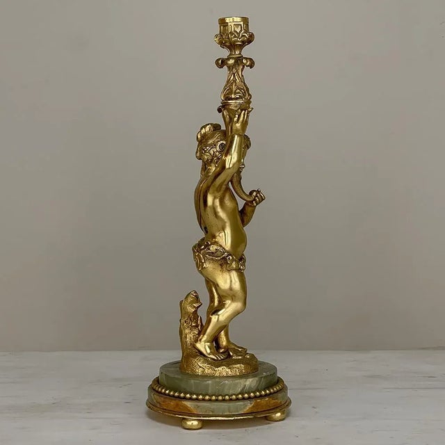 Antique Bronze D'Ore Cherub Statue on Onyx Candlestick celebrates classic beauty! The representation of an innocent cherub...