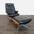 This Heywood-Wakefield lounge chair and ottoman set features sleek black leather upholstery with button tufting and...