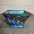 Bronze enamel finish with multiple hand painted character scenes. Beautiful light bright blue interior and base. Underside...
