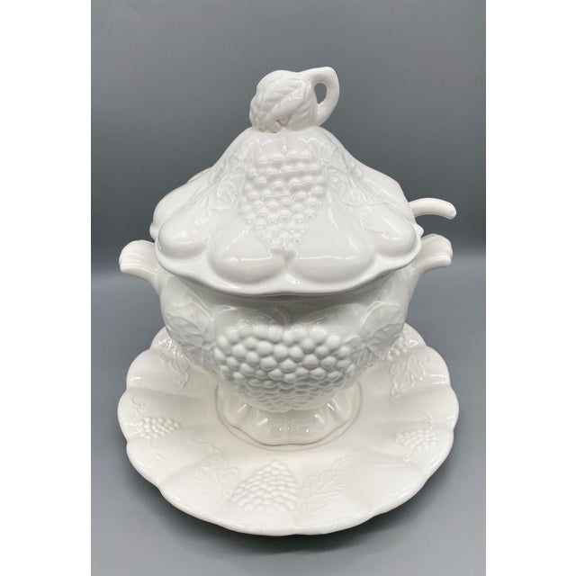 Gorgeous, large white soup tureen with its ladle and underplate. Embossed with lovely grape and grape vine leaf design....