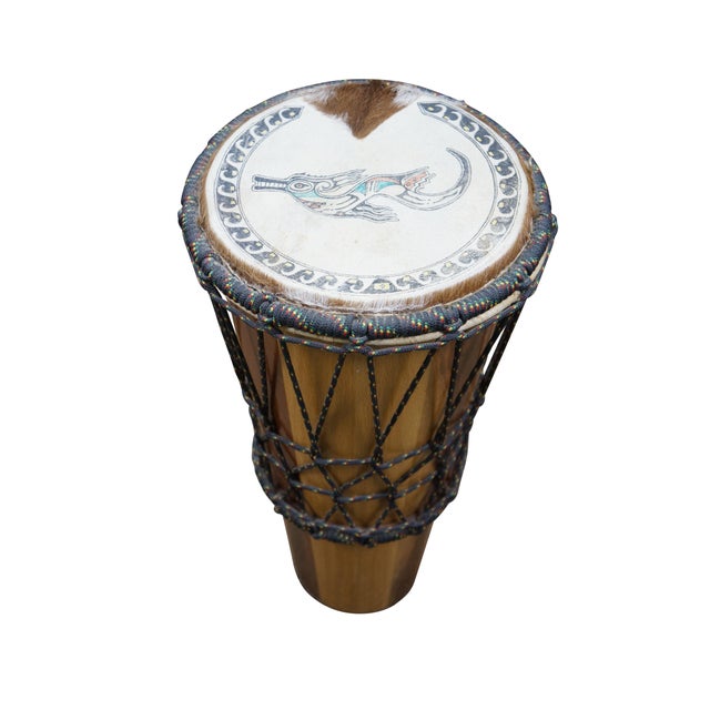 Late 20th century ashiko drum - tapered body of multi-toned panels of hardwood, toped with an 10" goat skin head, painted...