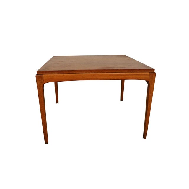 A beautiful American walnut end table by Lane Furniture Co. This Mid-Century Modern end table in walnut was made in...