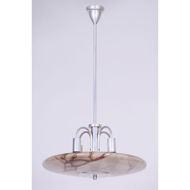 This magnificent pendant chandelier, originating from the 1940s from Czechoslovak production, represents an exemplary...
