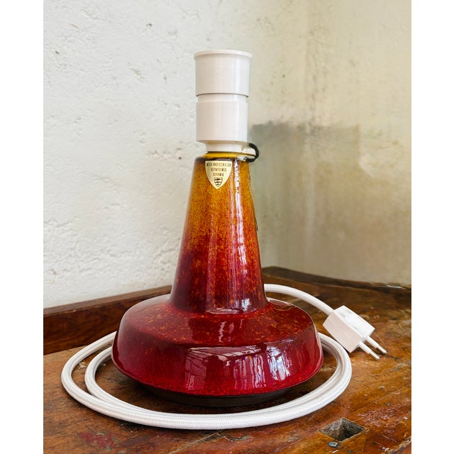 Beautiful and distinctive stoneware table lamp by the Bornholm ceramics manufacturer Michael Andersen & Søn. The lamp...