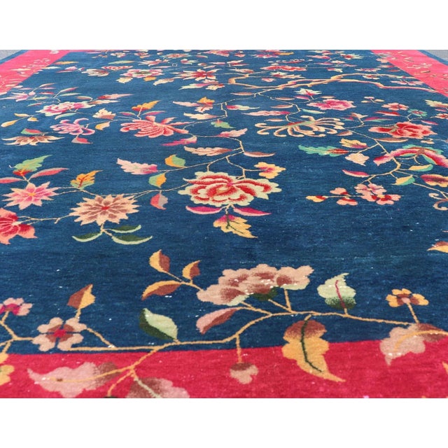 Art Deco Early 20th Century Blue Background Chinese Art Deco Rug With Large Vining Flowers and Leaves For Sale - Image 3 of 12