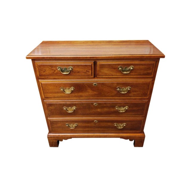 It's an authentic Oxford cherry dresser chest hand made by Statton Trutype Americana from the Colony House in Virginia....