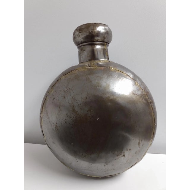 Very Rare and Collectible Damigiana Brass and Metal Water Bottle. Circa 1890-1919. Beautiful vintage hand-beaten, round,...