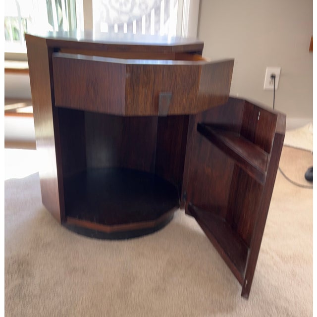 Description A striking mid-century modern decagon cabinet designed by Harvey Probber, circa 1950. This sculptural piece...