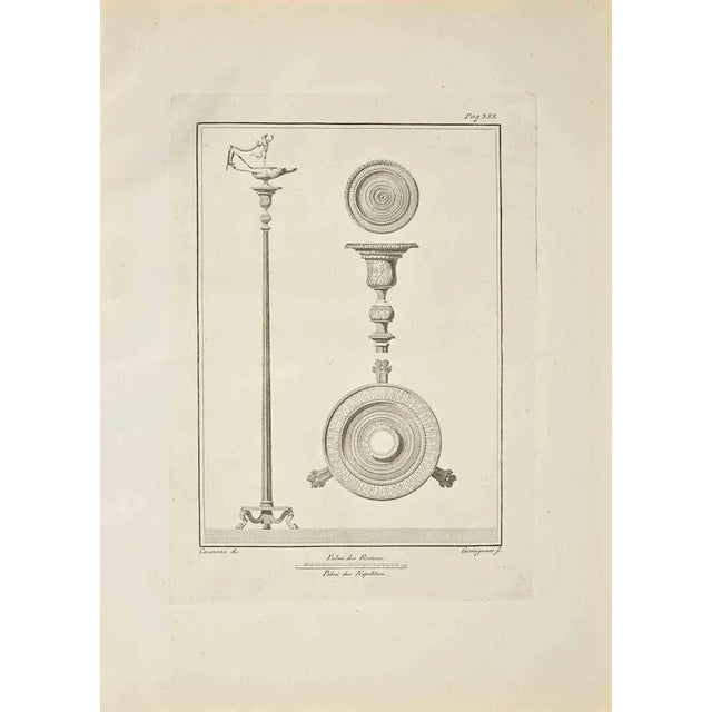 Ancient roman artifacts from the series "antiquities of herculaneum", is an original etching on paper realized by...