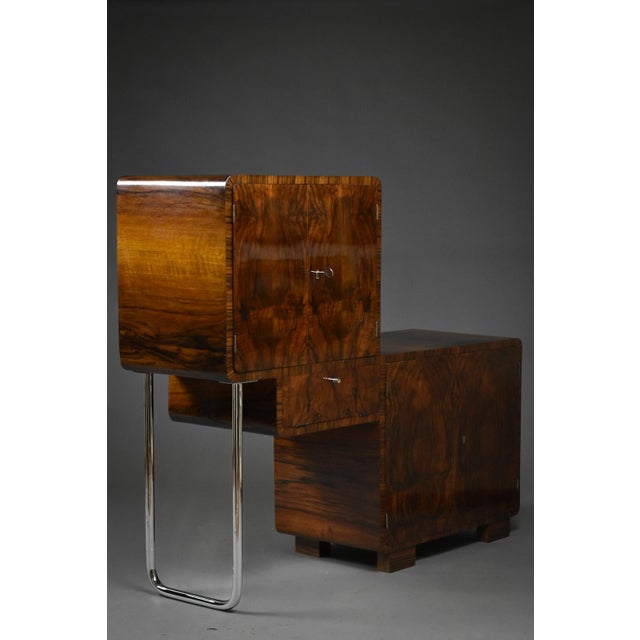 This striking Art Deco cabinet from 1930s Poland is a rare and sculptural piece, blending bold geometry with functionalist...