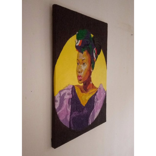 This artwork presents a striking portrait of a woman adorned in vibrant colors, showcasing the intricate interplay of...