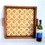 Offered is a walnut stained bamboo square tray with handles that has a two-toned diamond pattern woven base. Perfect on an...