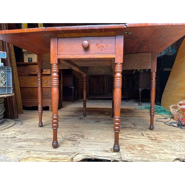 Federal Style Solid Cherry Gate Leg Drop-Leaf Table. 19th Century. Solid wood , dovetail drawer. Sturdy, Well made...