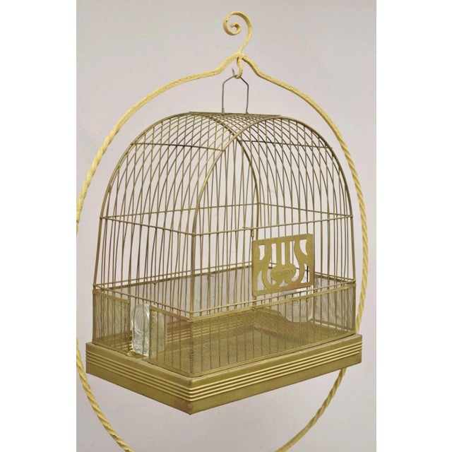 Antique Hendryx Art Nouveau Wrought Iron Bird Cage & Stand with Flowers and Vine. Circa Early 20th Century. Measurements:...