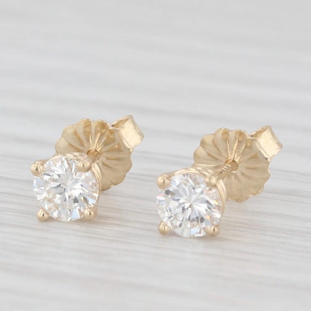 Modern New 0.67ctw Diamond Stud Earrings 14k Yellow Gold Round Solitaire Studs - 2 Pieces For Sale - Image 3 of 6