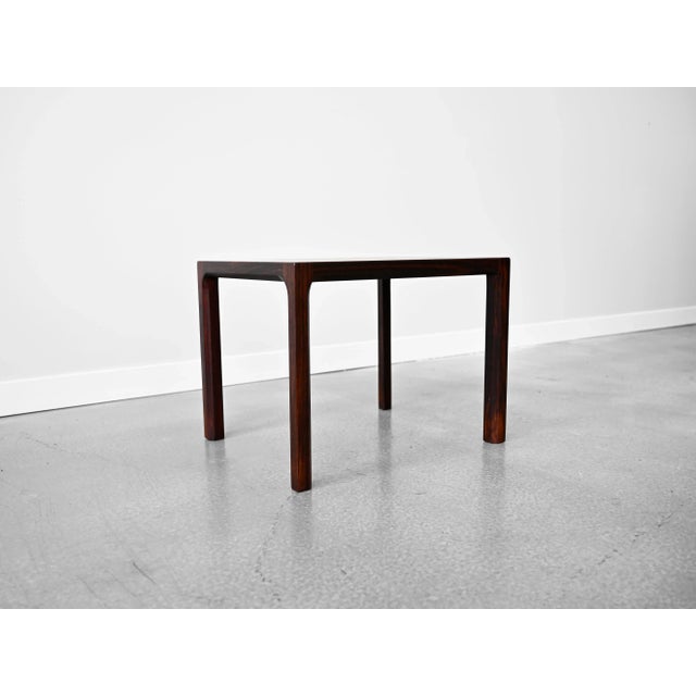 Vintage Danish side table crafted from beautifully figured Brazilian Rosewood showcasing exceptional joinery by Kai...