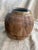 A stunning, large-scale antique terracotta storage jar with incredible patina and presence. This bulbous, hand-thrown...