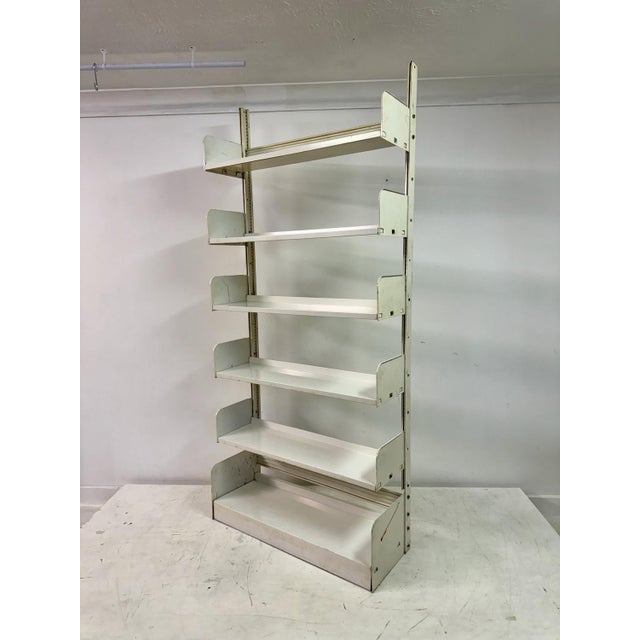 Congresso' shelving unit by Lips Vago. In white lacquered steel, Italy, 1960s. with adjustable shelves. A classic design...