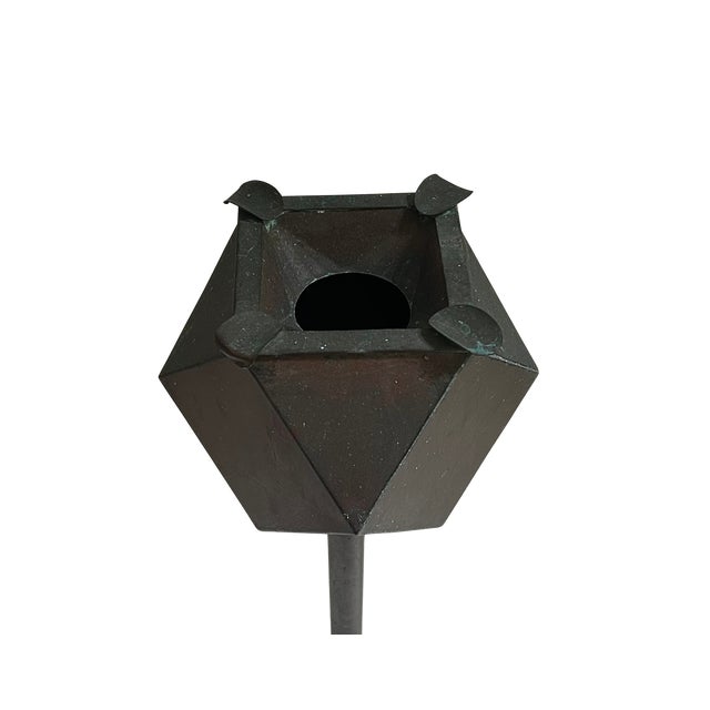 Art Deco freestanding ashtray crafted in copper. Ashtray has four cigarette rests.