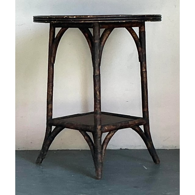 Introduce a touch of exotic charm and natural texture to your living space with this captivating vintage Boho Chic side...