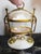 This is an antique French Palais Royal egg-shaped trinket box, often called a "casket".It is crafted from mother-of-pearl...