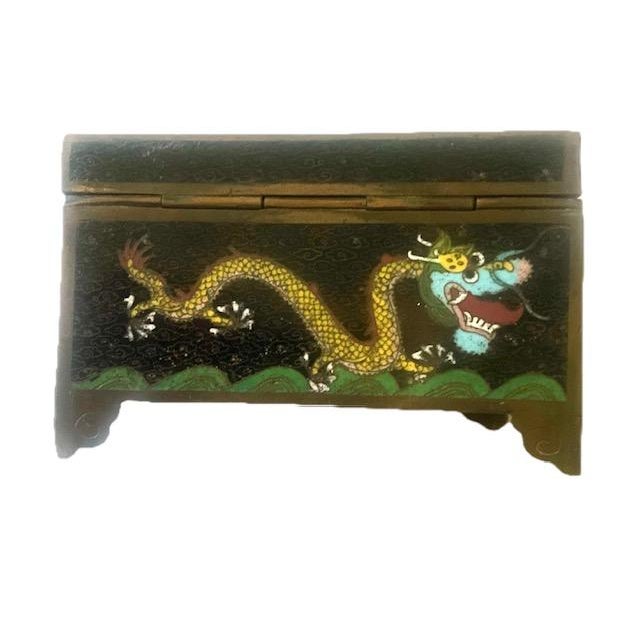 Chinese enamel bronze/copper rectangular trinket box featuring a black background and gold tone polychrome yellow dragons...