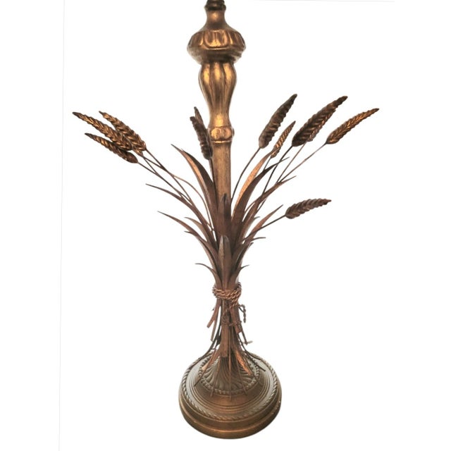 Bring a touch of mid-century glamour and organic elegance to your space with this stunning vintage table lamp by the...