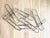 Mid-Century Modern Signed C. Jeré Giant Chrome Paper Clip Wall Sculpture, © 2002, Pop Art Postmodern Wall Art For Sale - Image 3 of 11