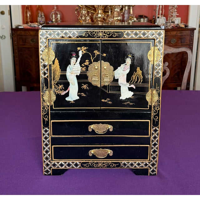 Vintage Chinese Asian Black Lacquer MOP Chinoiserie Table Top Cabinet. Two lower drawers and top cabinet with two doors....
