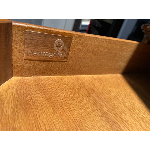 The Drexel Heritage Kidney Shaped Burled Wood Executive Desk is a stylish and luxurious addition to any home office or...