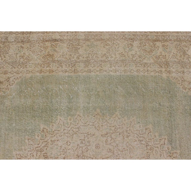 Distressed Turkish Rug With Floral Medallion in Light Green, Tan and Taupe For Sale - Image 10 of 13