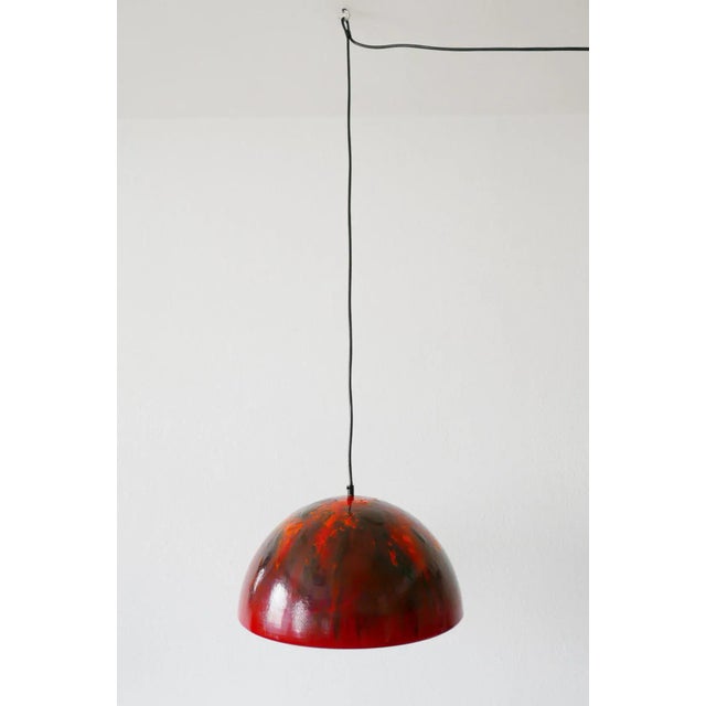 This is a rare, large mid-century modern pendant lamp. It was probably designed and manufactured in 1960s Denmark. It is...