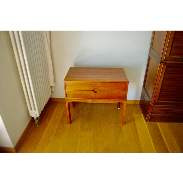 Teak bedside table, model 384, for Aksel Kjersgaard, dating from the 1950s/60s. A typical example of minimalist, refined,...