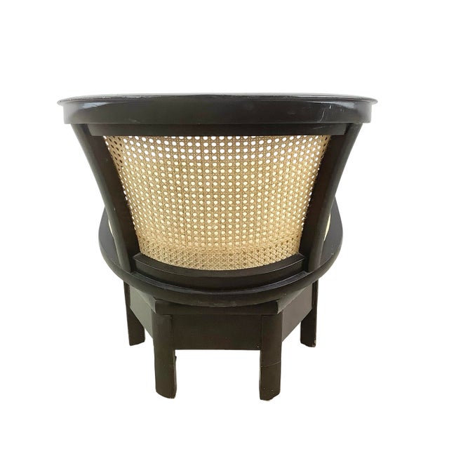 A striking Hollywood Regency swivel chair with real presence and personality. The continuous, crescent-shaped rail sweeps...