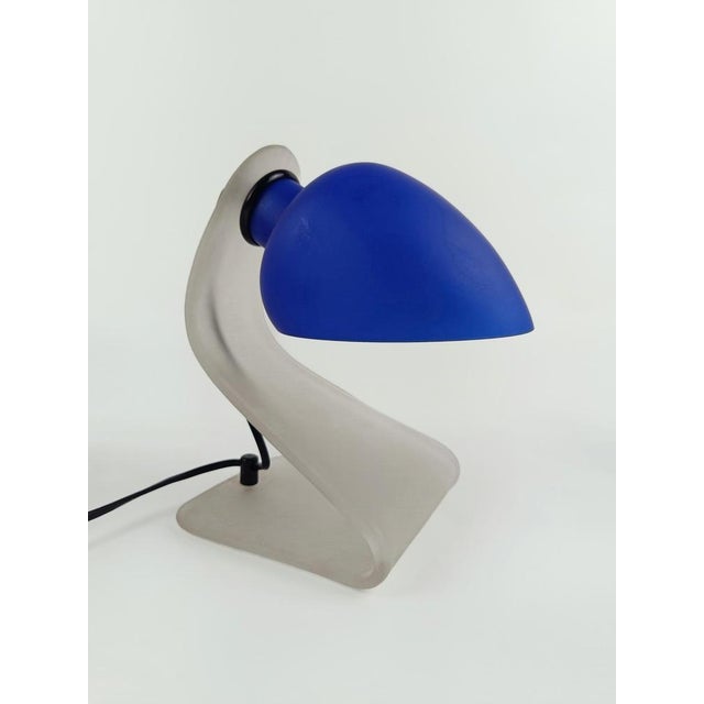 Set of 2 postmodern bedside lamps designed by Luigi Ghisetti and produced between the 80s and 90s by the Murano company...