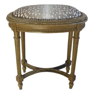 Antique French Carved Vanity Stool Newly Upholstered in a Designer Antelope Fabric Accented With Brass Nail Head Tacking For Sale