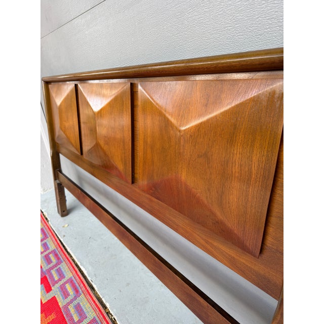 Rare and highly sought-after mid-century modern bed frame by United Furniture Co., featuring the iconic diamond sculpted...