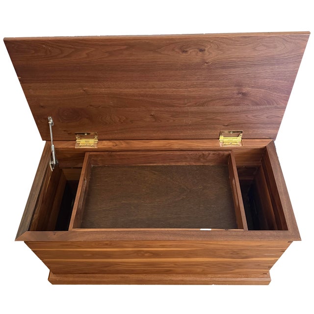 This handmade blanket chest was made of black walnut harvested and planed from the north side of Chicago. The chest...