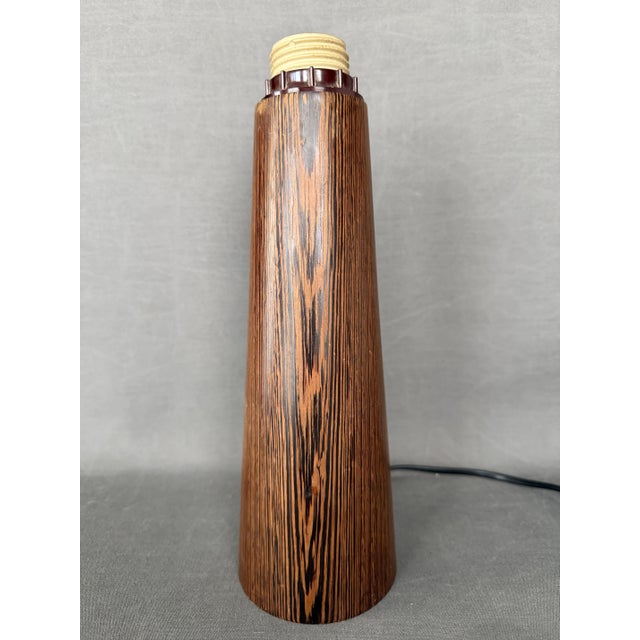 Table lamp of Scandinavian origin (Denmark, Norway, Sweden). Vintage, Wenge wood, 1960s design. Height with socket: 29 cm....