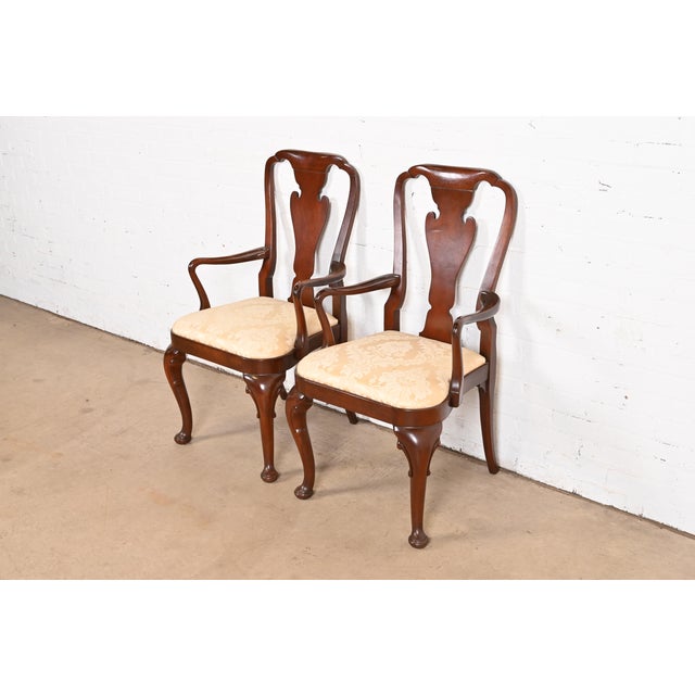 A gorgeous pair of Queen Anne or Georgian style dining armchairs By Baker Furniture, "Historic Charleston" Collection USA,...